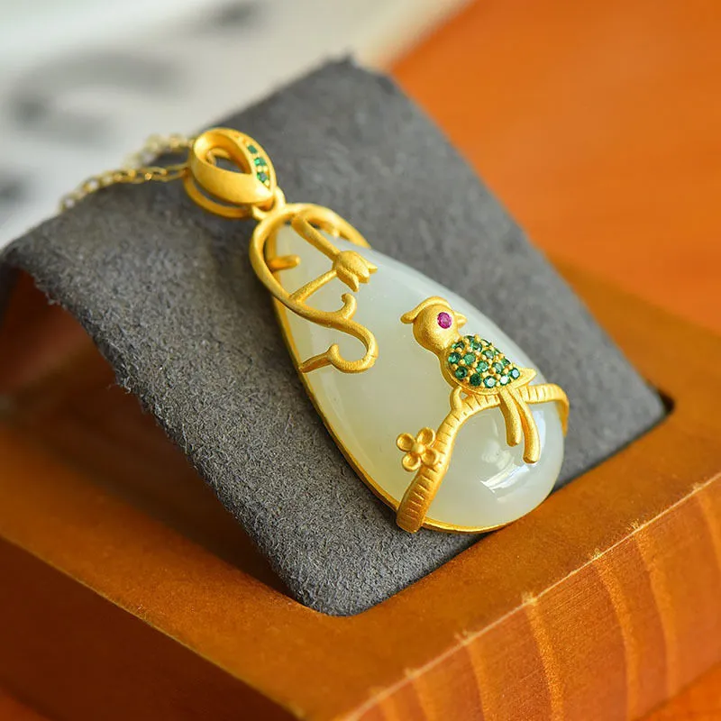 Exquisite and fashionable silver inlaid natural Hetian jade drop pendant