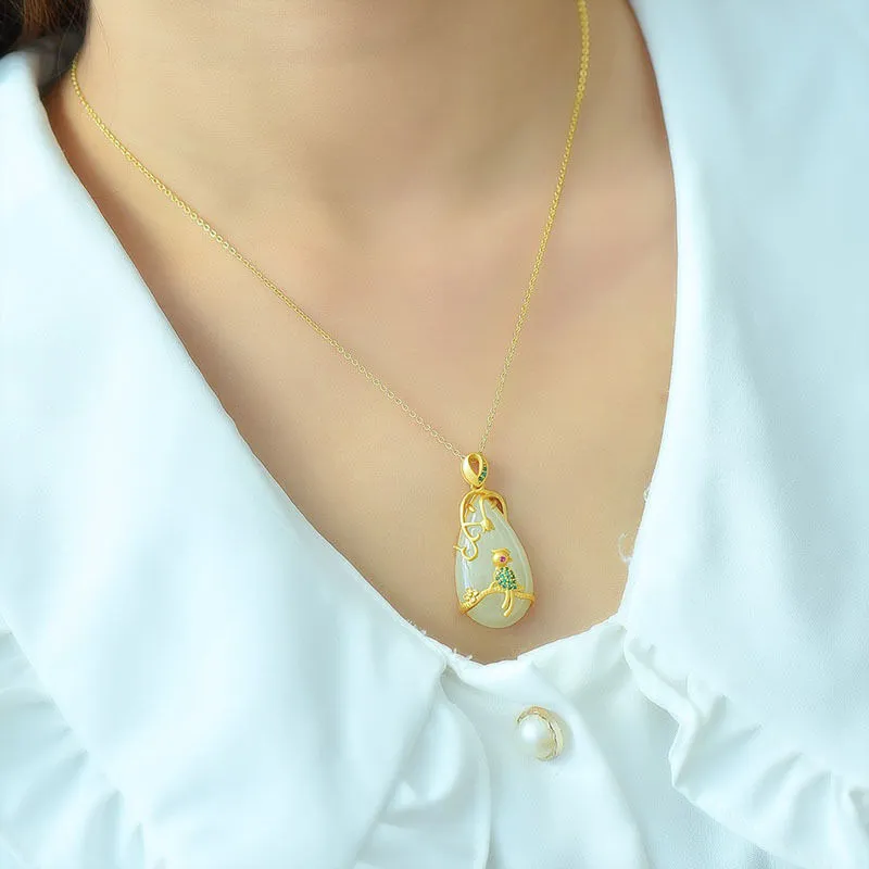 Exquisite and fashionable silver inlaid natural Hetian jade drop pendant