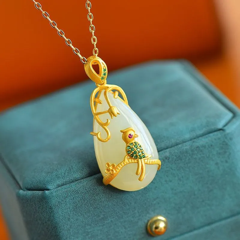 Exquisite and fashionable silver inlaid natural Hetian jade drop pendant