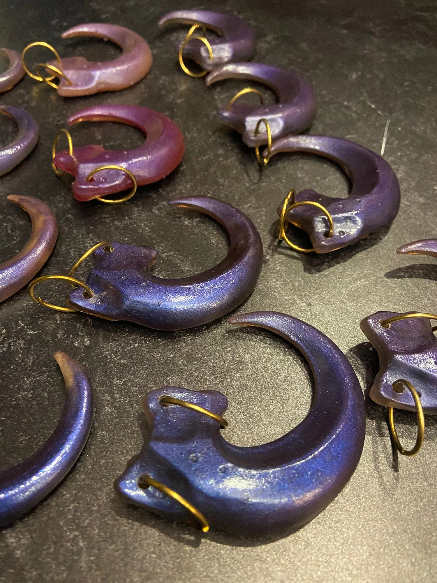 IRIDESCENT PURPLE CLAW PENDANT
