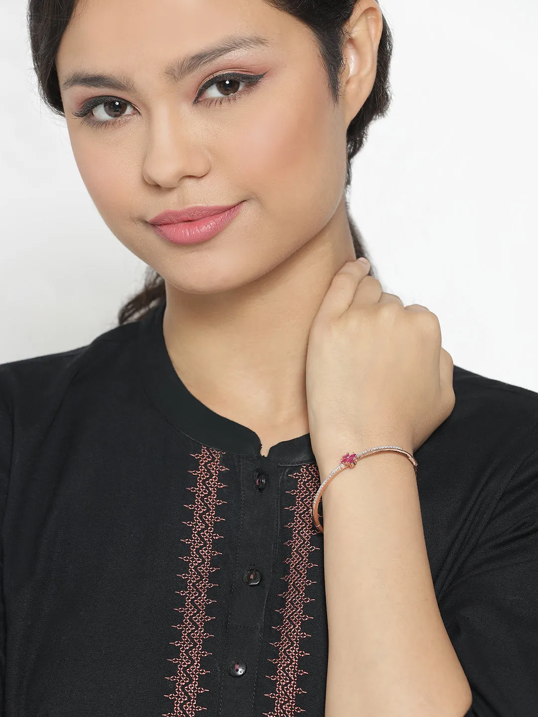 Rose Gold-Plated American Diamond And Ruby Studded Floral Patterned Bracelet